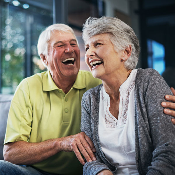 mature couple laughing together